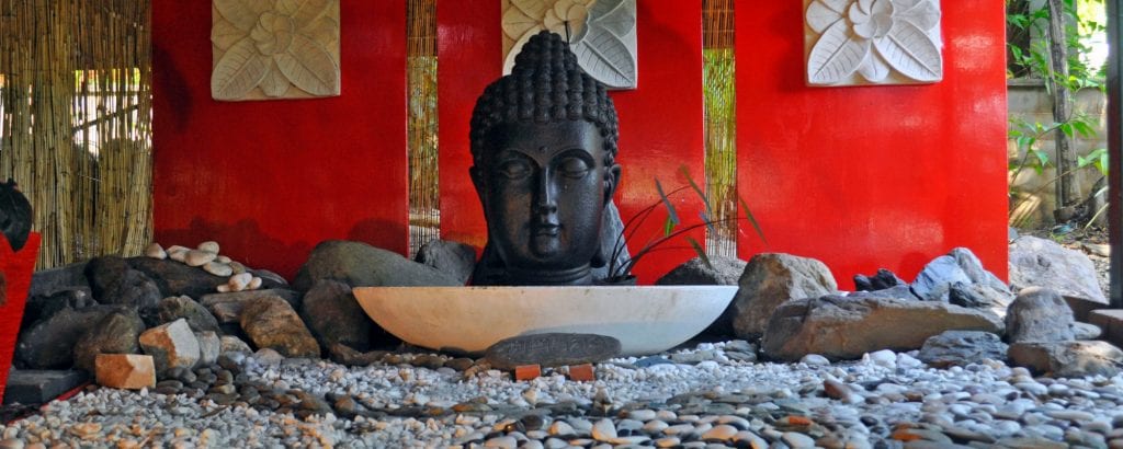 Buddha fountain in the beautiful gardens at Rainforest Reiki, Cairns