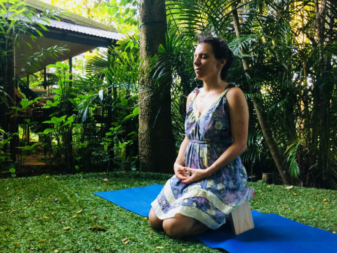 yoga student meditating at Rainforest Reiki in Cairns QLD