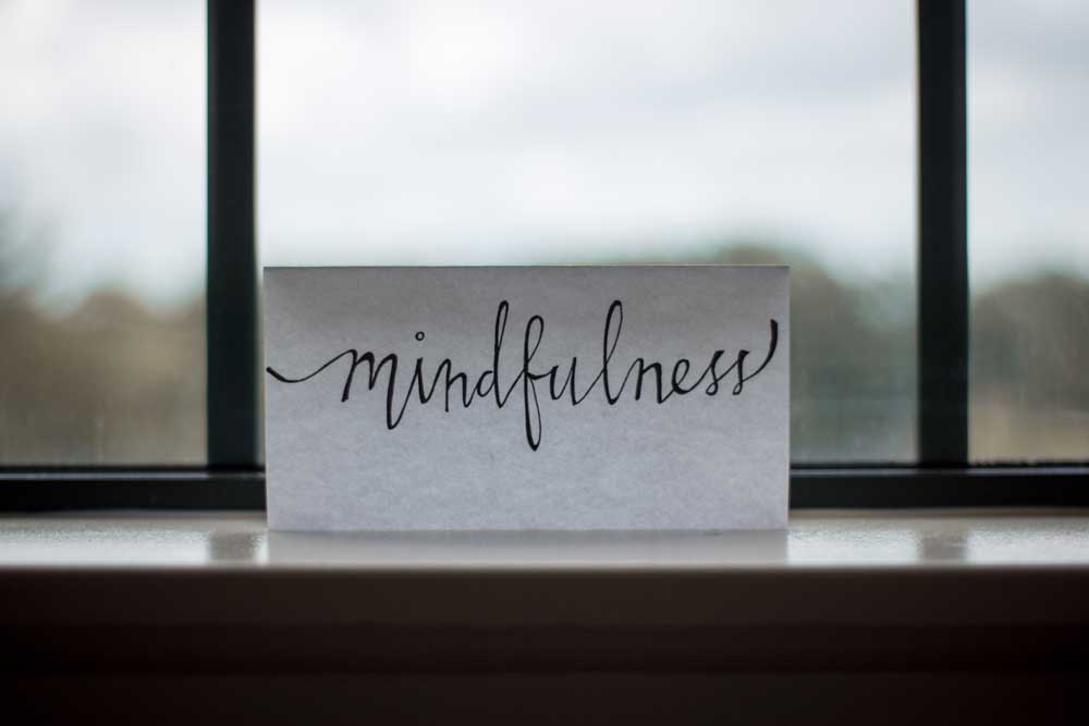 mindfulness written on a note in the window