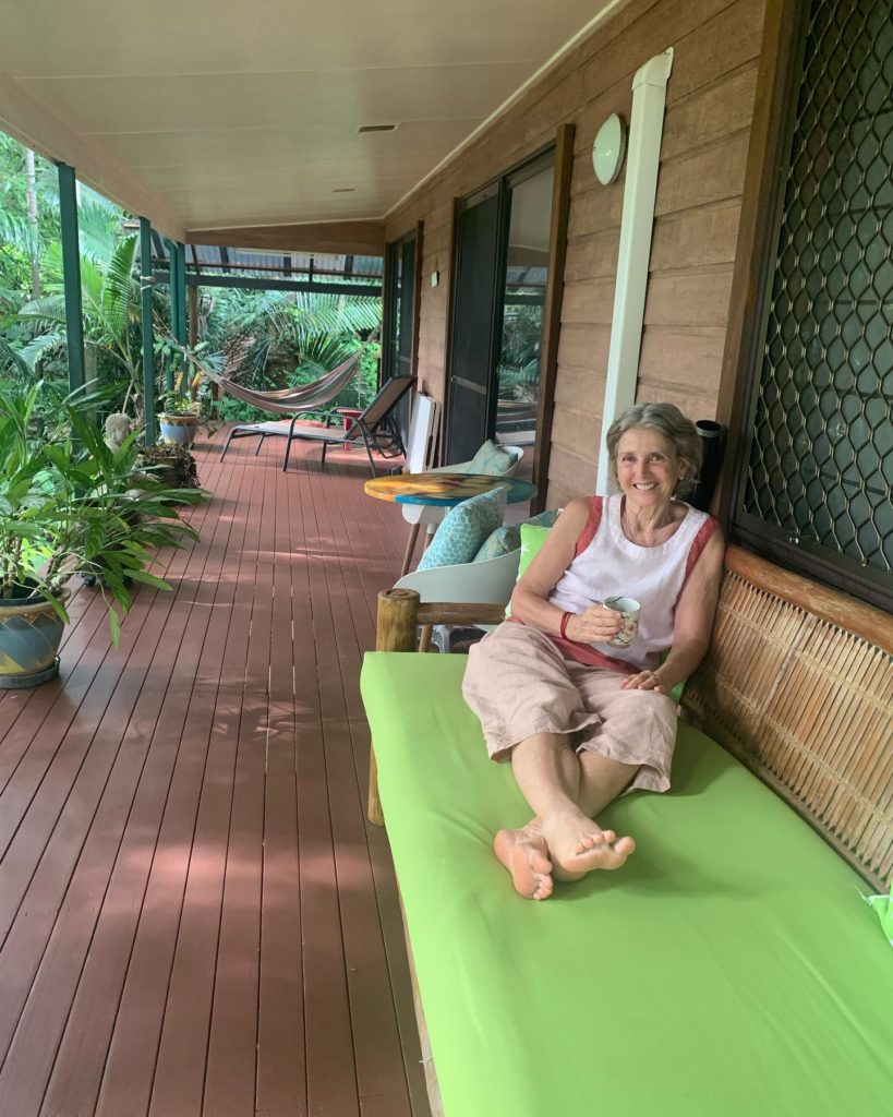 julie heskins relaxing in her rainforest reiki studio